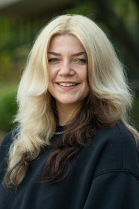 A portrait photo of Maya Gann-Bociek