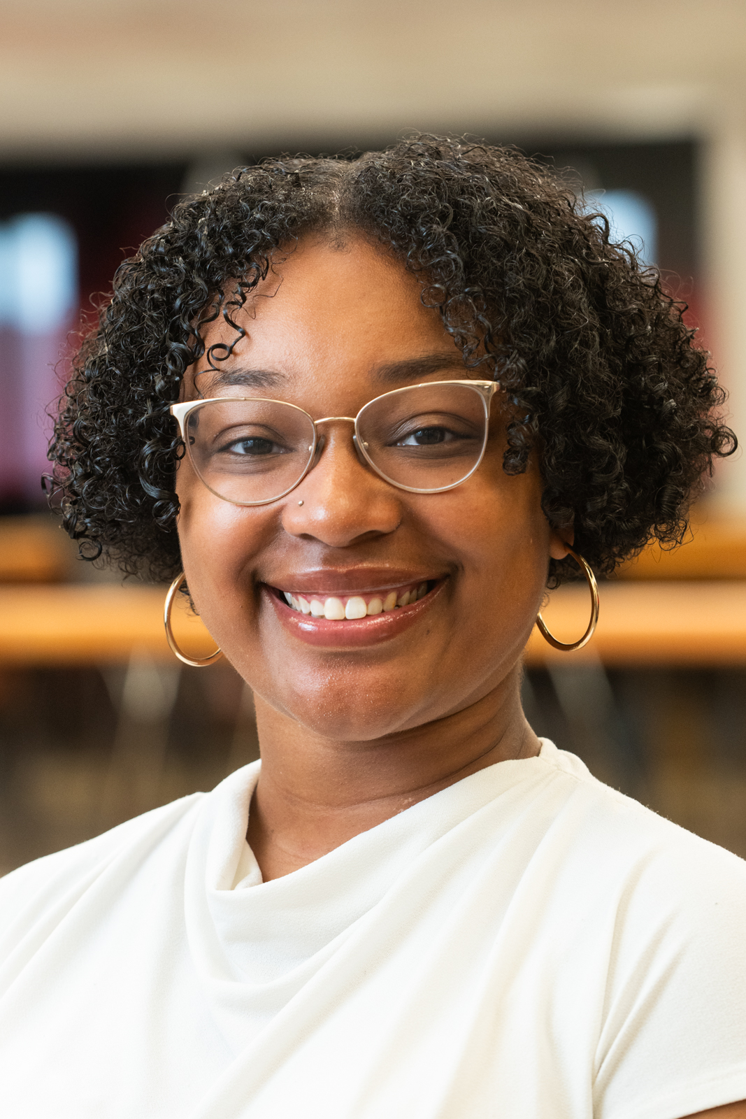 A portrait photo of Raynesha Green (she/her)