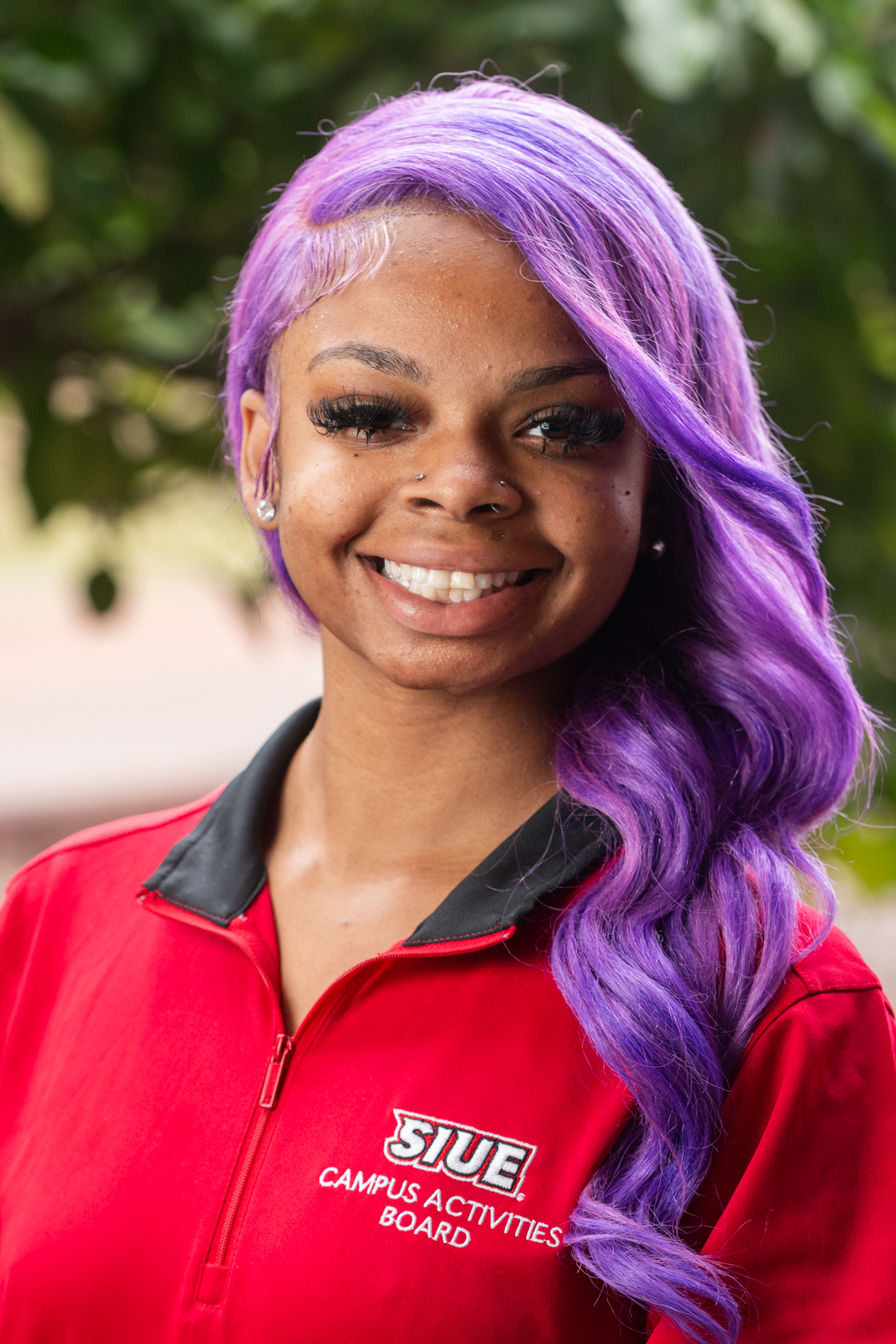 A portrait photo of Jasmine Davis (she/her)