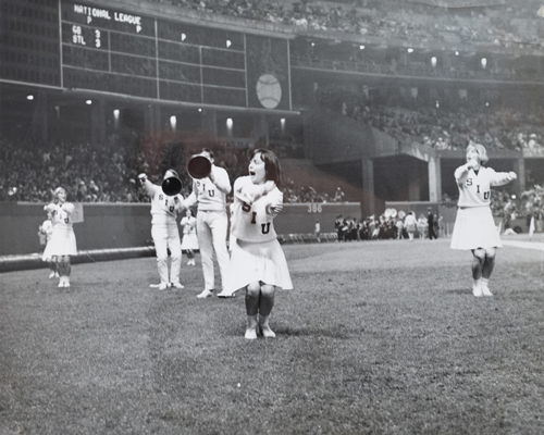 Cheerleaders cheering at Busch Stadium at the Green Bay Packers and football Cardinals game October, 1967