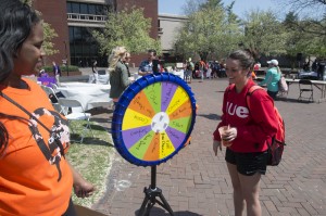 Students spin the prize wheel during the Springfest celebration.