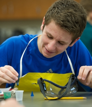 Ian Wall, of Belleville, participates in a science lab provided to his homeschool network by the SIUE STEM Center.