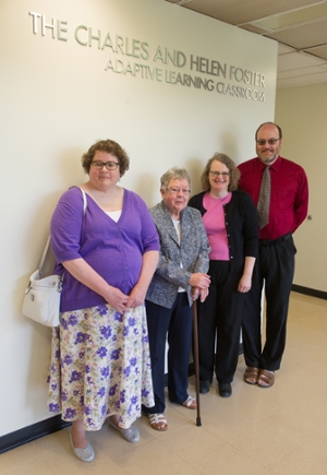 Standing outside the Charles and Helen Foster Adaptive Learning Classroom are (L-R) Kerrill Foster, Helen Foster, Ann Robertson and Dr. Tom Foster.