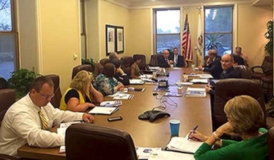 Madison County Chairman Alan Dunstan (Center), St Clair County Chairman Mark Kern (R), Silvia Torres Bowman of the International Trade Center at SIUE, and members of the Southwestern Illinois Trade & Investment Council meeting at America’s Central Port Wednesday, July 20.