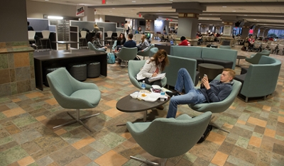 Students enjoy the renovated seating area in the Morris University Center.