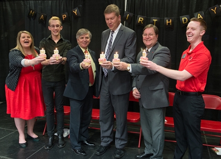 Celebrating the MUC’s 50th anniversary with a round of the Happy Birthday song were (L-R) MUC Director Kelly Jo Karnes, Christopher Crabel, a master’s candidate and chair of the University Center Advisory Board, Chancellor Randy Pembrook, Vice Chancellor for Student Affairs Jeffrey Waple, Alumni Association Board Member Ric Stephensen, and Student Body President Luke Jansen.