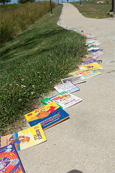 Volunteers helped create the line of books that stretched across SIUE’s campus for the Guinness World Record attempt.