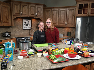 Kathy Mora and Taylor Aarns on the set of Show Me St. Louis