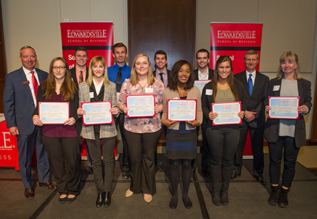 TheBANK of Edwardsville's Robert Schwartz (far left) stands alongside all 10 SIUE students receiving TheBANK of Edwardsville Scholarship, as well as School of Business Interim Dean Tim Schoenecker, PhD (far right).