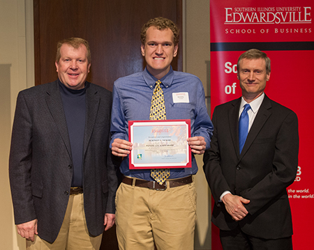 Pictured left to right are Brad Reed, PhD, CPA, professor and chair of the Department of Accounting; SIUE junior accounting major Mckinley Vickers, of Streator, the inaugural Wenzel CPA Scholarship recipient; and School of Business Interim Dean Tim Schoenecker, PhD. 