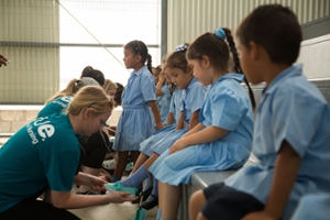 SON student Kristen Highfill distributes shoes in Costa Rica