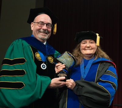 CAS Associate Dean Wendy Shaw was honored for her 15 years of service in that role.