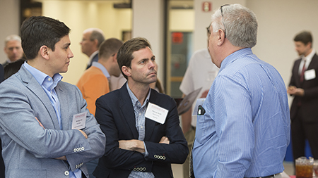 Trade representatives Rodrigo Cid and Marcelo Boffi attending “Discover Southwest Illinois” network with local business leader Ed Weilbacher, general manager of Kaskaskia Regional Port District.