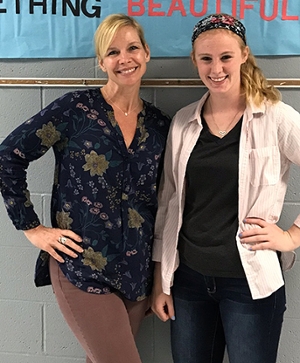 Standing alongside her cooperating teacher Mrs. Benson (left) is SIUE elementary education graduate Keri Teague (right). 