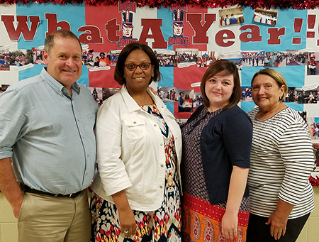 (L-R) SIUE’s Brian Johnson, PhD, stand alongside Gordon Bush Elementary’s Carmalita Neely, SIUE senior Abigail Cline, and Gordon Bush Elementary’s Gloria Oggero.