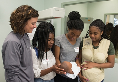 Healthcare Diversity Camp participants learned about pediatric care in the School of Nursing’s simulation center.