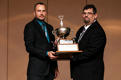 (R) Rick Lallish, program director of Water Pollution Control at the SIUE Environmental Resources Training Center, was honored by the IAWPCO as its Outstanding Operator of the Year. Presenting the award is (L) 2017 IAWPCO President Josh Stevens.