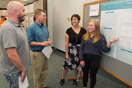 Maria Brauer, a rising junior from Belmont University and Jennifer McBride, a rising junior from SIUE, present their findings at the REU Symposium.