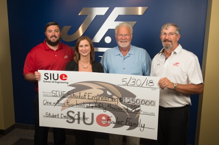 The Fowler Family has presented the SIUE School of Engineering with $1.25 million for the completion of the Fowler Student Design Center. (L-R) Jonathan, Mandy, Jim and Greg Fowler.