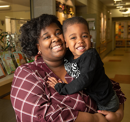 SIUE student parent Melody Peterson shares a big smile with her son Princeton who attends the SIUE Early Childhood Center.