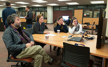 Attendees listen to and watch digital stories produced by students in Jessica DeSpain’s Honors 250 course.