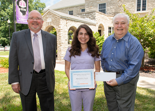 SIU SDM Dean Bruce Rotter, DMD, ISDS Foundation scholarship recipient Lexi Nash, and Keith Dickey, DMD, SIU SDM Director of Alumni Services and Continuing Education.