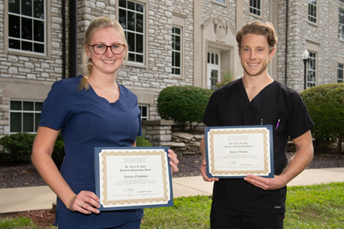 Recipients of the Dr. Larry Lowe Memorial Scholarships are SIU School of Dental Medicine students Lauren Nicholson (left) and Hunter Watson.