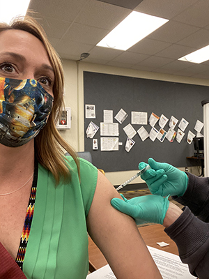SIUE School of Pharmacy Associate Dean Jessica Kerr, PharmD, gets vaccinated.