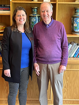 Jim McPike, MA ’74 (right), and Rachel Stack, Vice Chancellor for University Advancement.
