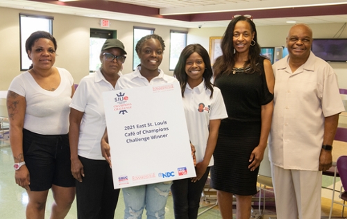 (L-R) Café of Champions finalists Martinae Binford of The Crab Trap (3rd place); Cynthia Richardson, Jere Richardson and Shay Jones of Miss Jay’s Cafeteria (1st place); and Andrea Ramsey and Arthur Ramsey Jr. of Susie Q’s Catering (2nd place).