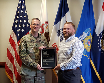 Col. Steve Sattinger (left) presented SIUE alumnus Stefan Flynn with the 2021 U.S. Army Corps of Engineers (USACE) Early Career Geoprofessional of the Year award.