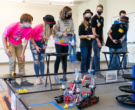 Two teams compete in the FIRST Tech Challenge robotics competition hosted at SIUE.