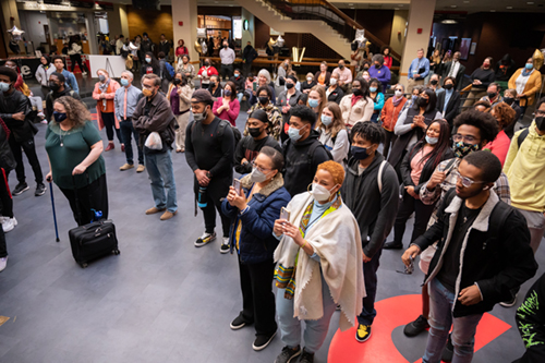 A crowd of supporters gathered on Thursday, March 3 for a surprise celebration in honor of Howard Rambsy, II, PhD.