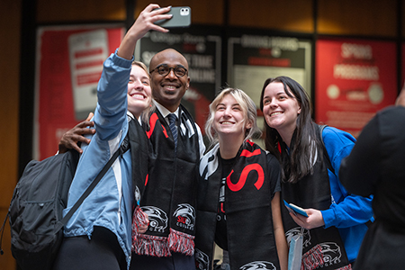 SIUE Chancellor James T. Minor poses for a selfie while meeting students on campus.