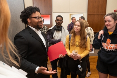 School of Nursing senior Demarco Brownlee shares details on his team’s research project, entitled “Ethnic Hair Care on Pediatric Inpatient Floors.”