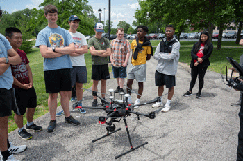 Engineering Summer Camp participants engage in drone surveying. 