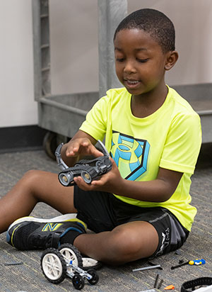 Third grade student, Christopher Hayden, gets creative with building during Odyssey Science Camp.