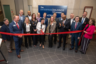 Representatives from SIUE and Enterprise Holdings Foundation cut a ribbon to signify the dedication of the Enterprise Holdings Foundation Atrium and state-of-the-art robotics lab in the SIUE School of Engineering Building.