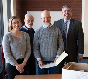(L-R) Marlee Graser, MSLIS, interim associate dean of library and information services, Stephen Kerber, PhD, university archivist and unique collections librarian, Jason Stacy, PhD, professor in the Department of History, and Shane Taylor, director o