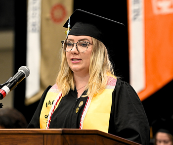 SEHHB student speaker Hannah Sauerhage addresses her fellow graduates.