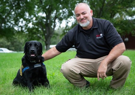 SIUE’s Police Department electronic detection K9 Marshall and his handler Detective Sergeant Dave Baybordi.