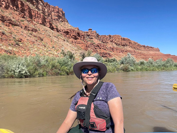 Adriana E. Martinez, PhD, associate professor in the College of Arts and Science rafting near Mexican Hat. Photo by Sarah Praskievicz.