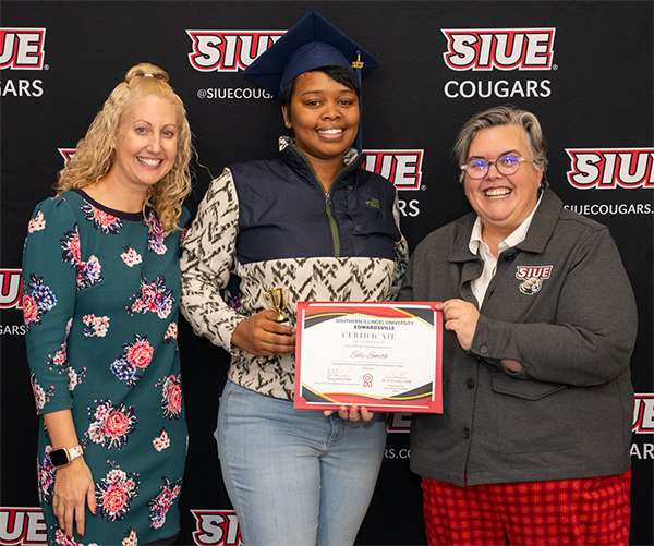 Tyson Foods SIUE FSQA Digital Badge graduate Edie Smith with SIUE coordinator Natalie Whitman and Provost Denise Cobb