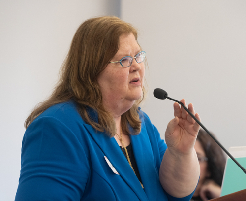 Liesveld speaking at the podium