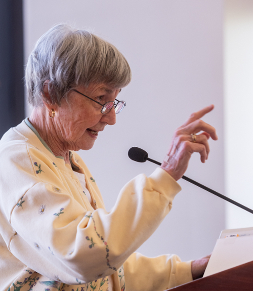 Wehrle speaking into the podium