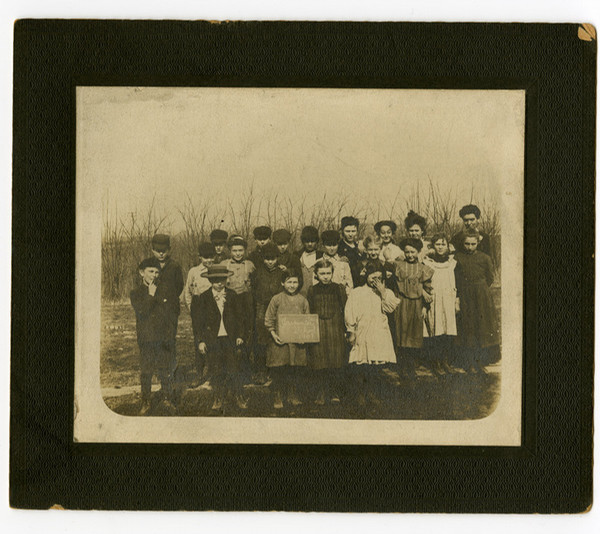 Archive photo of children holding sign