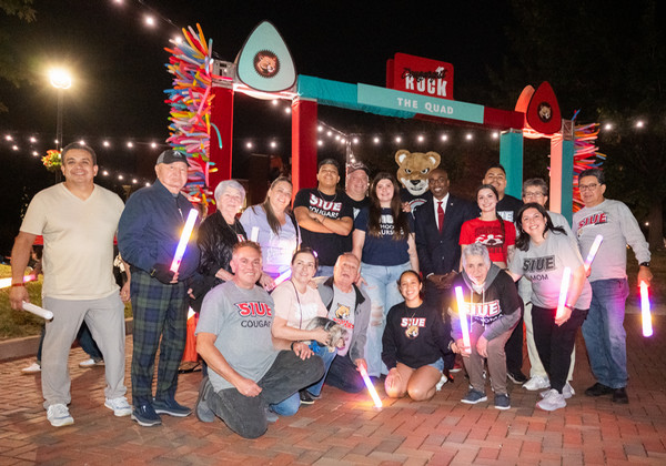 Family photo with Chancellor Minor and Eddie the Cougar