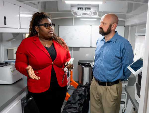 Dr. Garner and Rep. Schmidt inside the Mobile Health Unit 