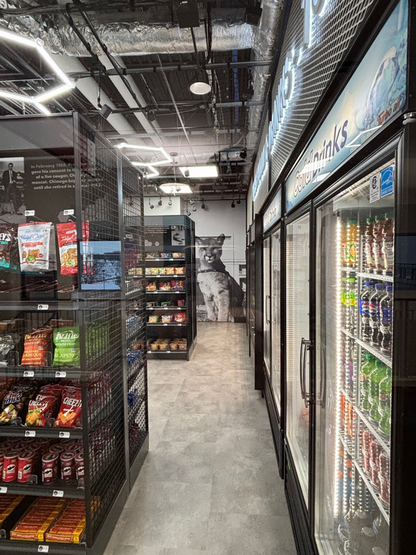 store aisle with photo of cougar at the end