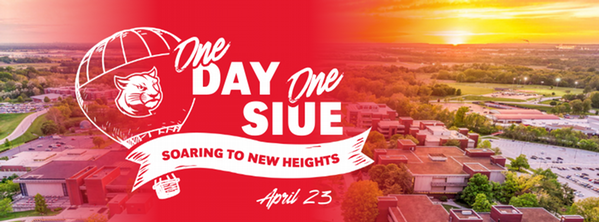 Aerial view of SIUE campus at sunset with red overlay graphic reading “One Day, One SIUE – Soaring to New Heights, April 23.”